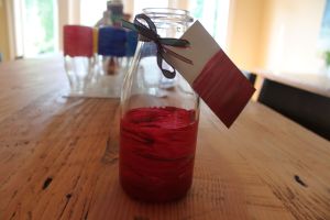 painted vase with name tag